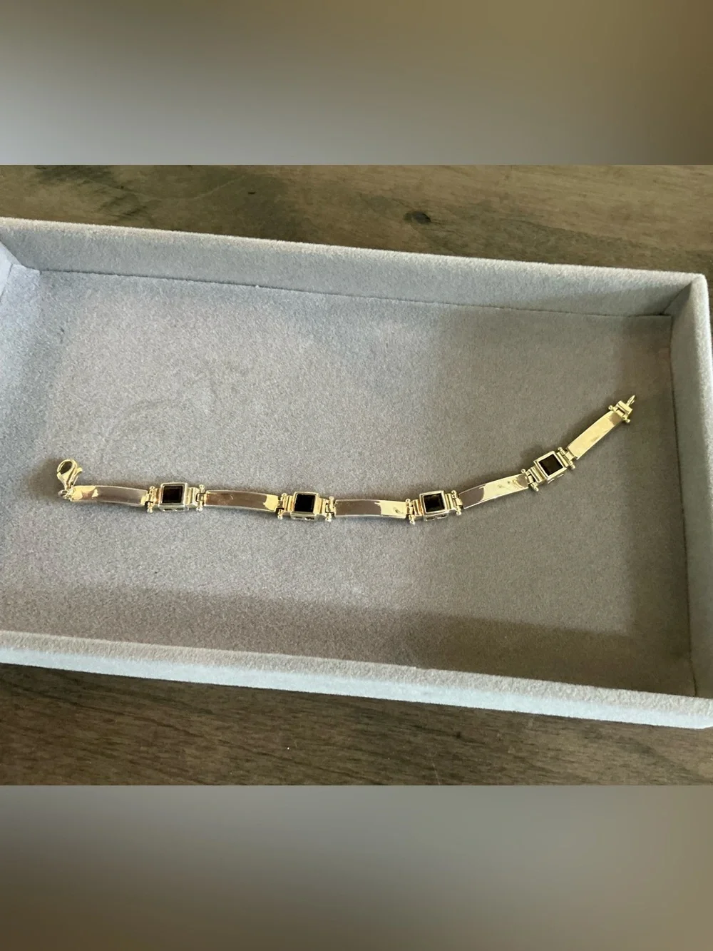 925 Silver Bracelet with dark stones.